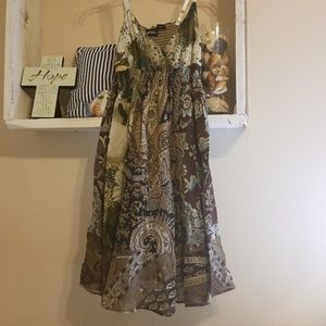 Cute adjustable spaghetti strap dress.